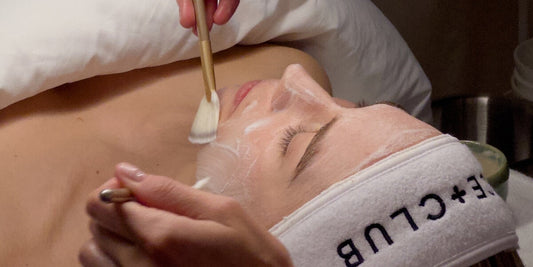 Client receiving a customized facial treatment at Face Club for glowing, healthy skin