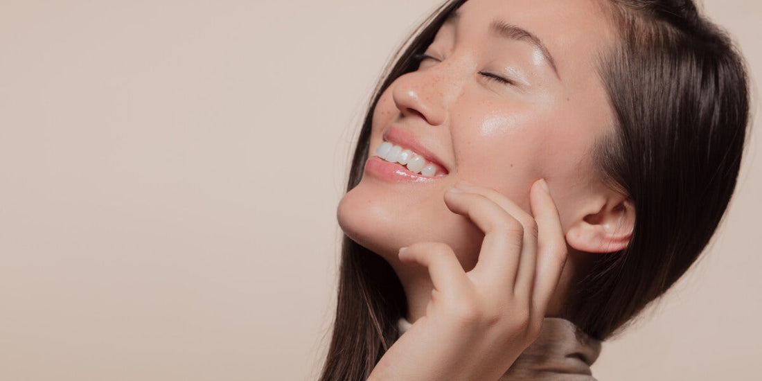 Bride applying skincare as part of a wedding skin prep routine for glowing, radiant skin