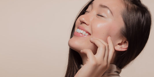 Bride applying skincare as part of a wedding skin prep routine for glowing, radiant skin