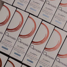 Multiple boxes of Osmosis Clarify product arranged in rows.